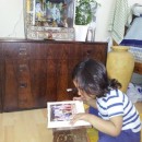 Small Devotee Reading Gita