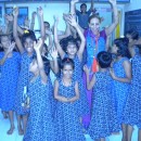 Bhaktin Radhika Distributing Books and chanting with Girls at Balika Ashram