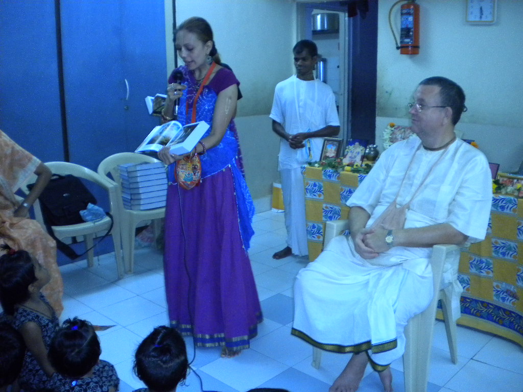 Bhaktin Radhika Distributing Gita at children Orphanage Balika Ashram